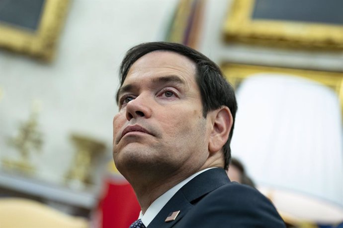 February 24, 2025, Washington, District Of Columbia, USA: Secretary of State Marco Rubio looks on while President Donald Trump meets with President of France Emmanuel Macron in the Oval Office at the White House in Washington, DC on Monday, February 24, 2