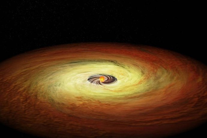 Esta ilustración muestra una estrella de menor masa rodeada por su disco formador de planetas de gas y polvo.