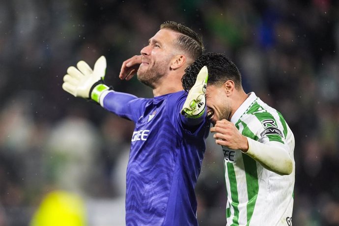 Adrian San Miguel and Marc Bartra of Real Betis celebrate the victory during the Spanish league, LaLiga EA Sports, football match played between Real Betis and Real Madrid at Benito Villamarin stadium on March 1, 2025, in Sevilla, Spain.