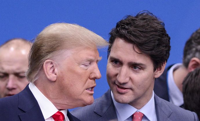 Archivo - 4 de dezembro de 2019, Watford, Inglaterra, Grã-Bretanha: O primeiro-ministro Justin Trudeau e o presidente dos EUA, Donald Trump, chegam para participar de uma sessão plenária na Cúpula da OTAN em Watford, Hertfordshire, Inglaterra, na quarta-f