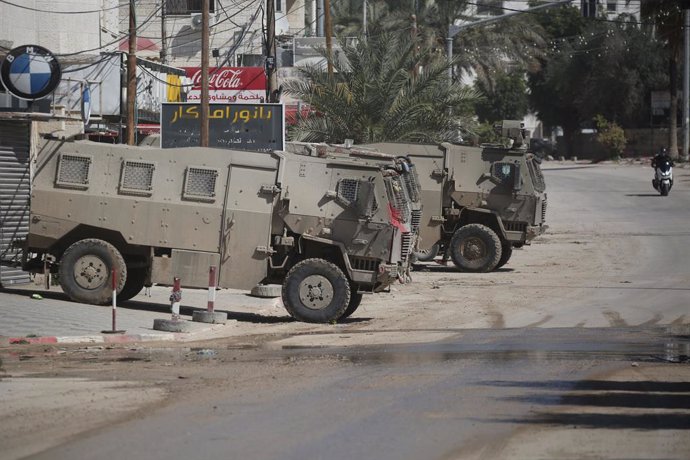 02 March 2025, Palestinian Territories, Nur Shams: Israeli army vehicles seen in the Nur Shams refugee camp, near the West Bank city of Tulkarem, during an Israeli military operation. Photo: Mohammed Nasser/APA Images via ZUMA Press Wire/dpa