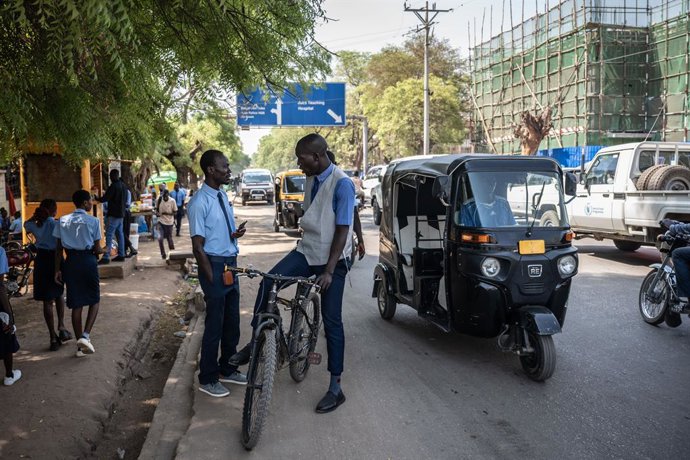 JUBA, Feb. 27, 2025  -- Students communicate with each other on the street in Juba, South Sudan, on Feb. 25, 2025.