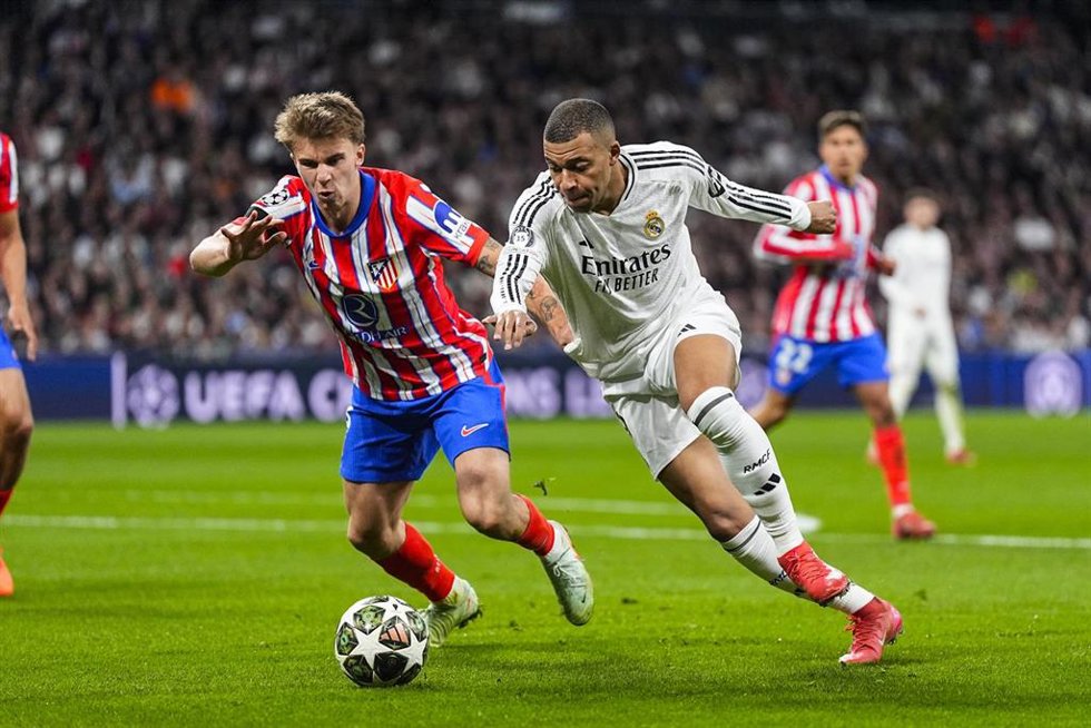 Pablo Barrios of Atletico de Madrid and Kylian Mbappe of Real Madrid in action during the UEFA Champions League 2024/25 League Round of 16 First Leg match between Real Madrid CF and Atletico de Madrid, at Santiago Bernabeu stadium on March 04, 2025, in
