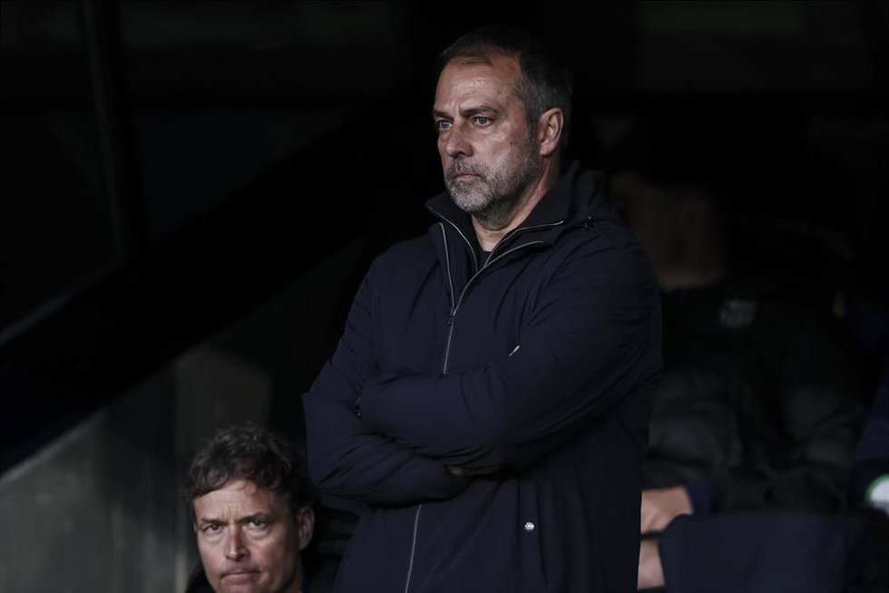 Hansi Flick, head coach of FC Barcelona looks on during the UEFA Champions League 2024/25 Round of 16 second leg, match between FC Barcelona and SL Benfica at Estadi Olimpic Lluis Companys on March 11, 2025 in Barcelona, Spain.