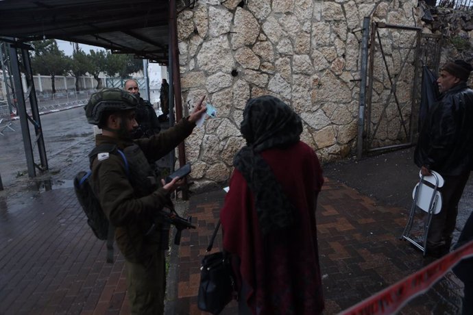 March 7, 2025, Bethlehem, West Bank, Palestinian Territory: Palestinians walk through an Israeli checkpoint as they make their way to attend the first Friday prayers of the fasting month of Ramadan in Jerusalem's al-Aqsa mosque, in the West Bank city of B