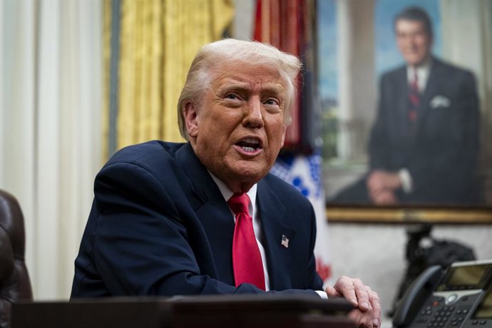 March 6, 2025, Washington, District Of Columbia, USA: United States President Donald Trump speaks in the Oval Office of the White House in Washington, DC, US, on Thursday, March 6, 2025. Trump is signing orders to pause tariffs on USMCA trade from Canad