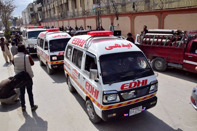 QUETTA (PAKISTAN), March 13, 2025  -- Ambulances carrying victims of a train attack arrive for a funeral in Quetta, Balochistan province, Pakistan, on March 13, 2025. Twenty-one passengers, four soldiers and 33 terrorists were killed after heavily armed t