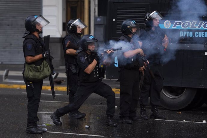 March 12, 2025, Buenos Aires, Argentina: Police officers fire tear gas at the protesters around the Congress during the rally.. Retirees protested at the National Congress demanding dignified living conditions. Supporters and protesters who joined the wee