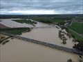 Desalojo de un asentamiento en Sevilla y cierre de compuertas de la Vega de Triana ante la crecida del Guadalquivir