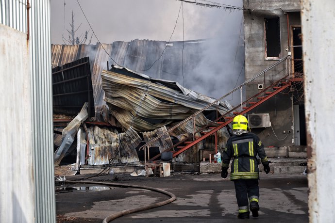 11 March 2025, Ukraine, Odesa: A firefighter works at the scene of a fire caused by a Russian drone strike in Odesa. Photo: -/Ukrinform/dpa