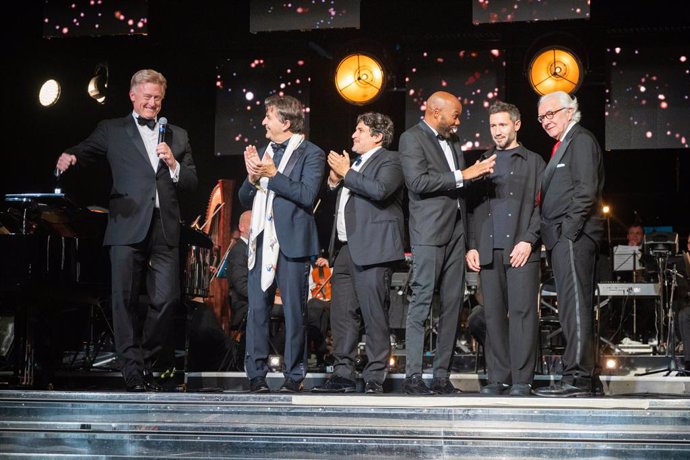 Forbes Travel Guide CEO Hermann Elger honored Chef Alain Ducasse with the Award of Excellence by Baccarat at The Summit in Monaco on February 27. A powerhouse line-up of chefs joined Elger (left) and Ducasse (right) on stage, including Yannick Alléno, Mau