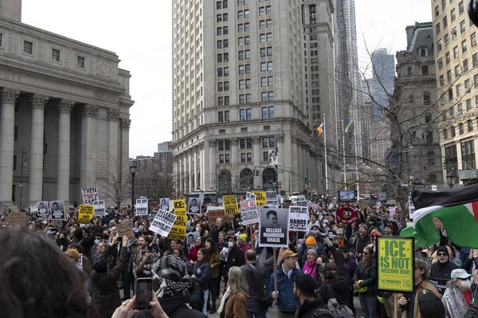 12 March 2025, US, New York: Demonstrators chant and hold signs that read 'ICE IS NOT WELOCME HERE!' 'RELEASE MAHMOUD KHALIL' outside the U.S. Courthouse in Manhattan's Foley Square. Protesters rally to denounce the arrest and detention of Khalil, a Colum