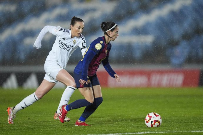 Aitana Bonmati of FC Barcelona and Caroline Weir of Real Madrid in action during the Copa de la Reina, Spanish Women Cup, Semi Final First Leg match between Real Madrid and FC Barcelona, at Alfredo Di Stefano stadium on March 06, 2025, in Valdebebas, Madr