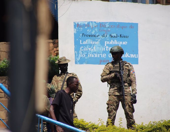 KINSHASA, March 13, 2025  -- This file photo taken on Feb. 27, 2025 shows Armed forces of the M23 rebel group patrolling in Bukavu, South Kivu Province, the Democratic Republic of the Congo (DRC). The DRC government and the M23 rebel group will hold direc