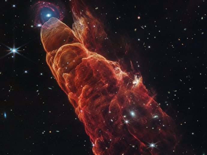 O Telescópio Espacial James Webb da NASA/ESA/CSA observou o Herbig-Haro 49/50, um fluxo de saída de uma estrela próxima ainda em formação, em luz infravermelha próxima e média de alta resolução com os instrumentos NIRCam e MIRI.