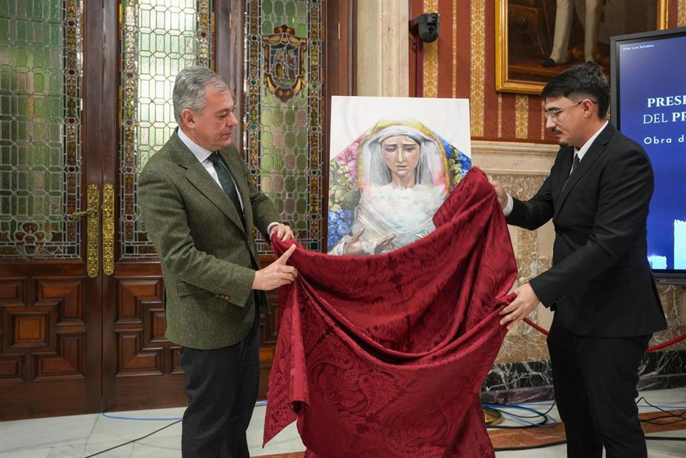 El alcalde de Sevilla, José Luis Sanz, descubre el cartel de los Desamparados de Alcosa con motivo de su presencia en el Pregón de las Glorias 2025.