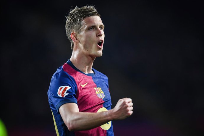 27 March 2025, Spain, Barcelona: Barcelona's Dani Olmo celebrates his side's second goal of the game during the Spanish La Liga soccer match between Real Madrid and CA Osasuna at Estadi Olimpic Lluis Companys. Photo: Matthieu Mirville/ZUMA Press Wire/dpa