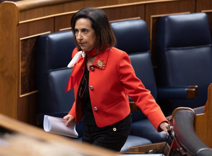 La ministra de Defensa, Margarita Robles, tras intervenir durante una sesión plenaria, en el Congreso de los Diputados, a 19 de marzo de 2025, en Madrid (España). 
