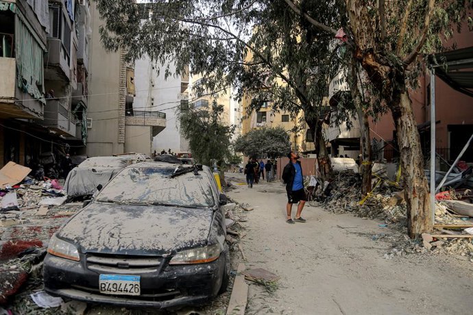 April 1, 2025, Beirut, Lebanon: A man inspects damage at the site where an Israeli air strike hit a building, damaging its upper three floors in Beirut's southern suburb, a stronghold of pro-Iranian Hezbollah. At least three people were killed and seven w