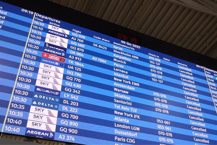 09 April 2025, Greece, Athens: The main board at Athens' empty Eleftherios Venizelos Airport shows flights canceled during a 24-hour strike. 