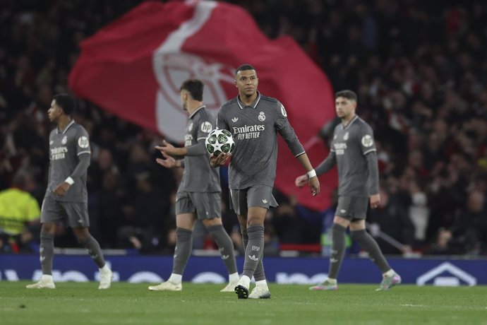 Kylian Mbappe of Real Madrid laments a goal scored by Declan Rice of Arsenal during the UEFA Champions League 2024/25 Quarter Final First Leg match between Arsenal FC and Real Madrid C.F. at Arsenal Stadium on April 08, 2025 in London, England.