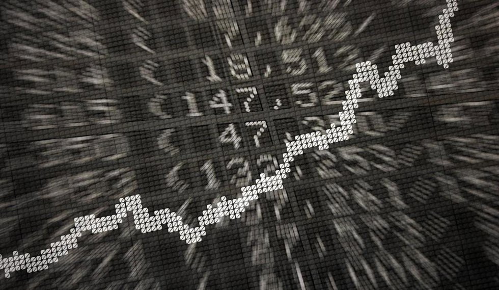 Archivo - FILED - 15 January 2014, Hesse, Frankfurt_Main: A large display in the stock exchange shows stock market prices. 