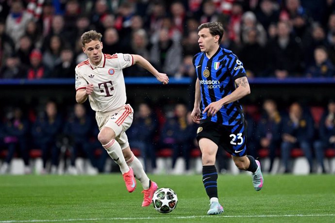 08 April 2025, Bavaria, Munich: Bayern Munich's Joshua Kimmich (L) and Inter Milan's Nicolo Barella battle for the ball during the UEFA Champions League quarter final first leg soccer match between Bayern Munich and Inter Milan at Allianz Arena. Photo: Sv