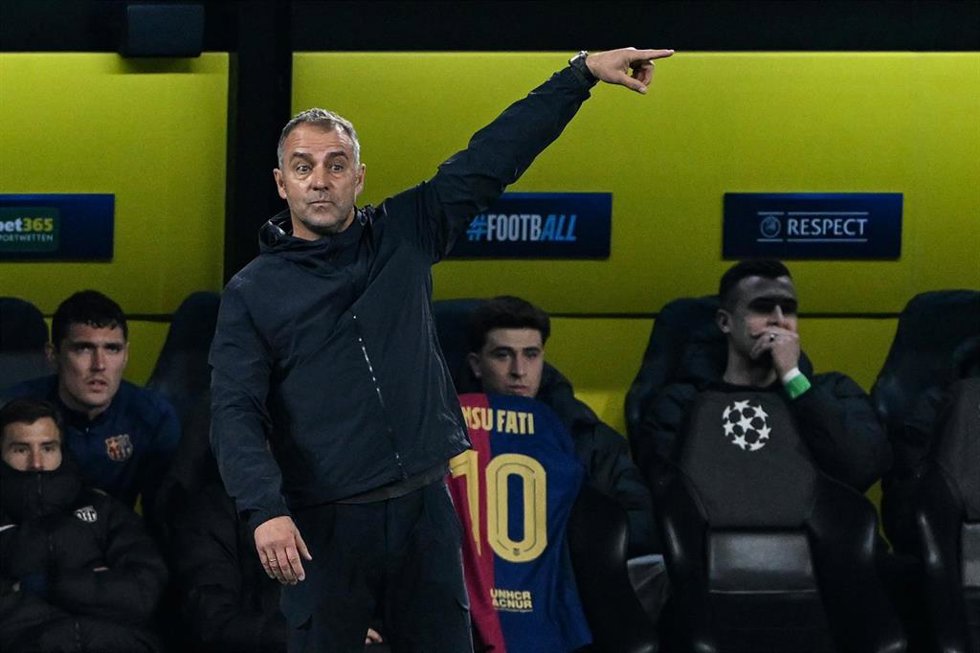 Barcelona coach Hansi Flick gestures on the touchline during the UEFA Champions League quarter-final second leg soccer match between Borussia Dortmund and FC Barcelona at the Signal Iduna Park
