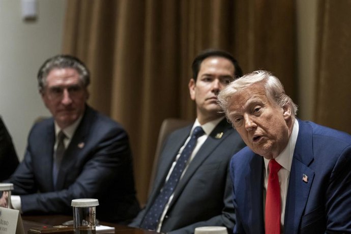 April 10, 2025, Washington, Dc, United States: U.S President Donald Trump, right, speaks during a cabinet meeting at the Cabinet Room of the White House, April 10, 2025 in Washington, D.C. 