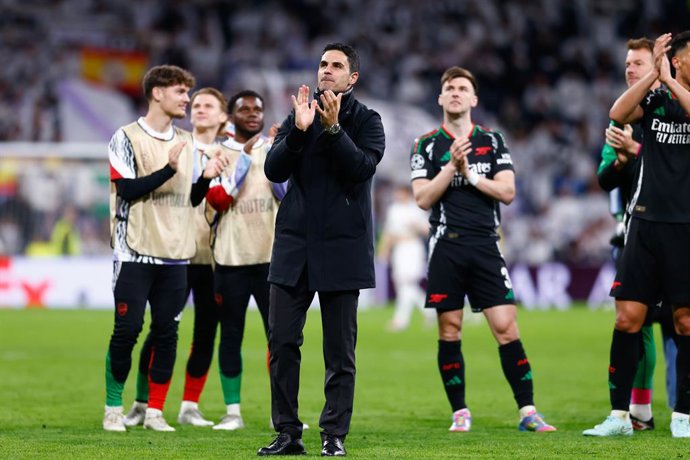 Mikel Arteta, head coach of Arsenal FC, celebrates the victory during the UEFA Champions League 2024/25 Quarter Final Second Leg match between Real Madrid C.F. and Arsenal FC at Santiago Bernabeu stadium on April 16, 2025, in Madrid, Spain.