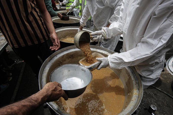 Reparto de comida en Gaza  