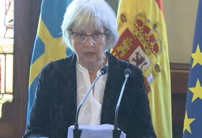 Paloma Biglino, impartiendo una conferencia en Oviedo