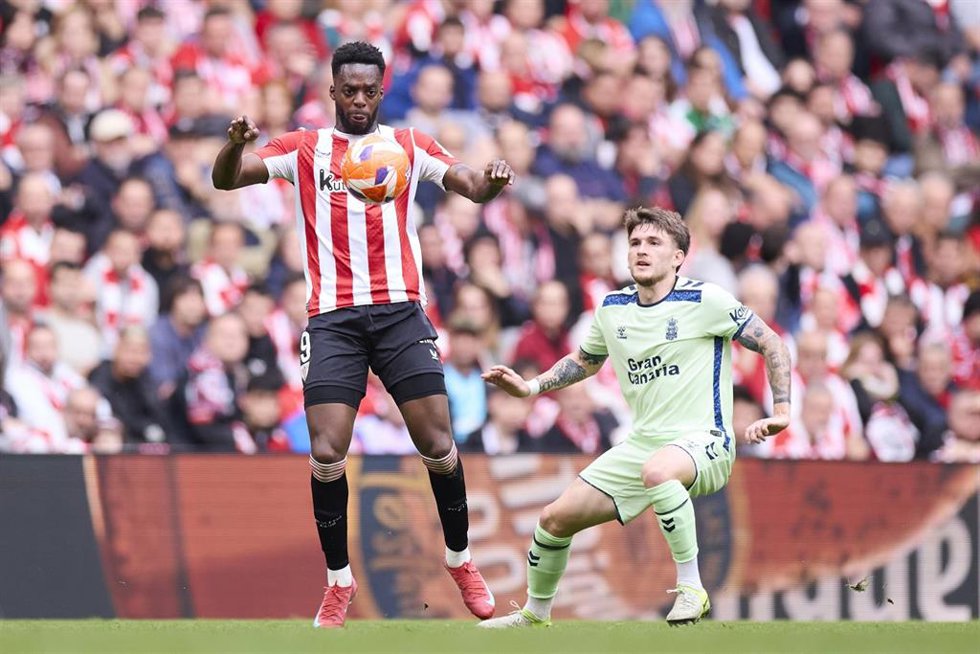 Inaki Williams of Athletic Club competes for the ball with Viti Rozada of UD Las Palmas during the LaLiga EA Sports match between Athletic Club and UD Las Palmas at San Mames on April 23, 2025, in Bilbao, Spain.