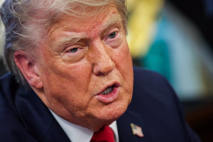 April 23, 2025, Washington, District Of Columbia, USA: United States President Donald Trump answers questions from reporters after signing executive orders in the Oval Office at the White House on April 23, 2025 in Washington, D.C. Trump signed seven exec