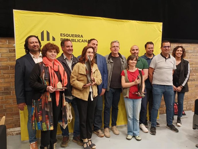 Junqueras con los premiados
