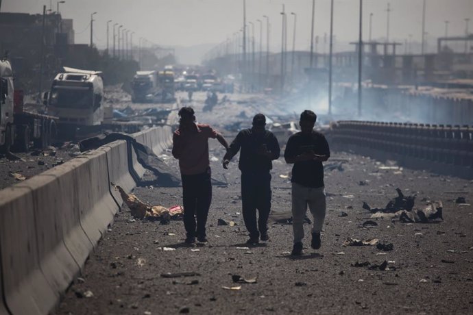 BEIJING, April 27, 2025  -- This photo shows the explosion site in Bandar Abbas of Hormozgan province, Iran, April 26, 2025. At least 8 people were killed and 750 others injured in a huge explosion that occurred on Saturday at a port in Iran's southern pr