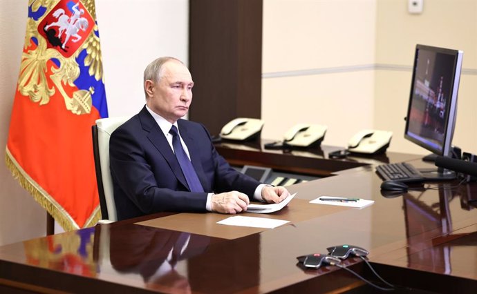 HANDOUT - 26 April 2025, Russia, Moscow: Russian President Vladimir Putin listens to Russian Chief of General Staff Gen. Valery Gerasimov with the report that all Ukrainian troops have been forced from Russia's Kursk region, during their meeting via video