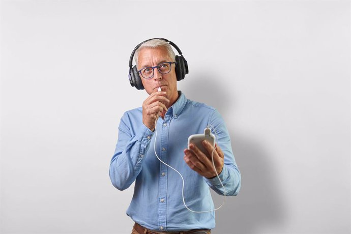 Tinnitus patient using FDA Approved Lenire tinnitus treatment device