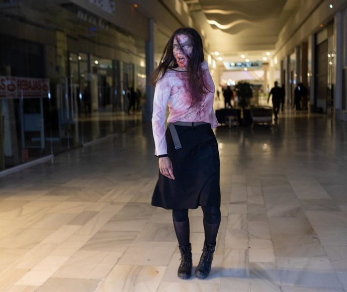 Imagen de una de las participantes del juego a tiempo real 'Survival Zombie'.