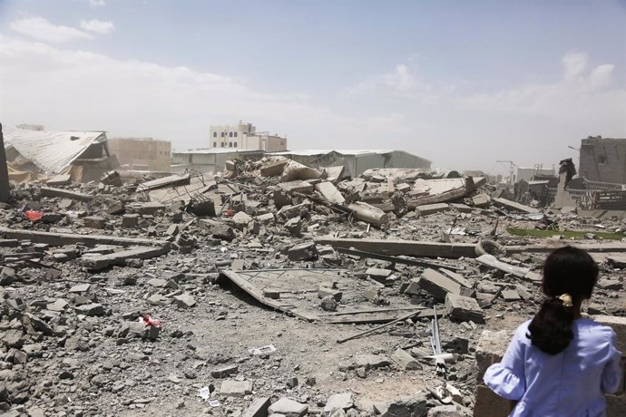 SANAA, April 27, 2025  -- A girl looks at piles of rubble after U.S. airstrikes in Sanaa, Yemen, on April 27, 2025. U.S. airstrikes on Yemen's Houthi-held capital Sanaa overnight killed two people and wounded 10 others, Houthi-controlled health authoritie