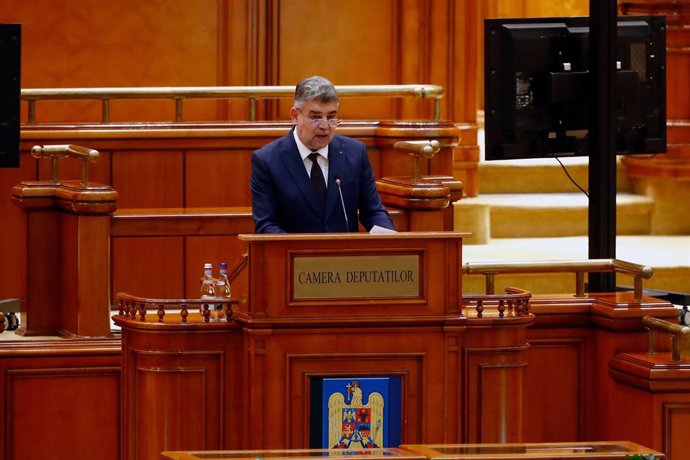 Archivo - BUCHAREST, Dec. 23, 2024  -- Marcel Ciolacu, leader of Romania's Social Democratic Party, speaks during an investiture vote at the Palace of Parliament in Bucharest, Romania, on Dec. 23, 2024. Romanian President Klaus Iohannis on Monday nominate