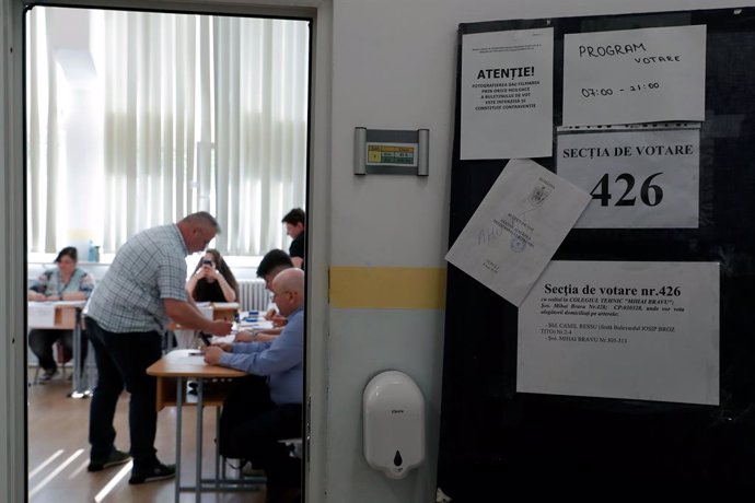 BUCHAREST, May 4, 2025  -- Voting announcements are seen at the entrance of a polling station during the first round of the presidential election rerun in Bucharest, Romania, May 4, 2025. Romanians headed to the polls on Sunday for the first round of the 