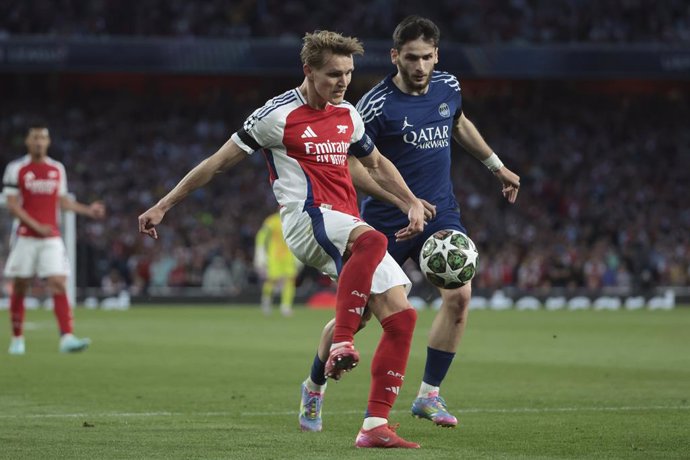 Martin Odegaard of Arsenal, Khvicha Kvaratskhelia of PSG during the UEFA Champions League, Semi-finals, 1st leg football match between Arsenal FC and Paris Saint-Germain (PSG) on April 29, 2025 at Emirates Stadium in London, England - Photo Jean Catuffe /