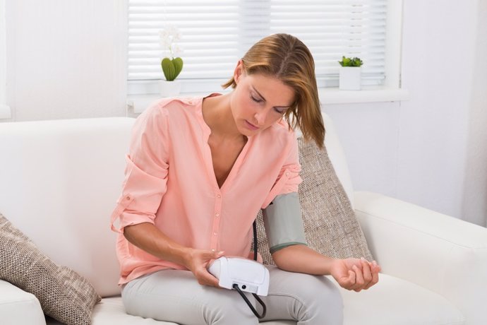 Archivo - Woman Checking Blood Pressure