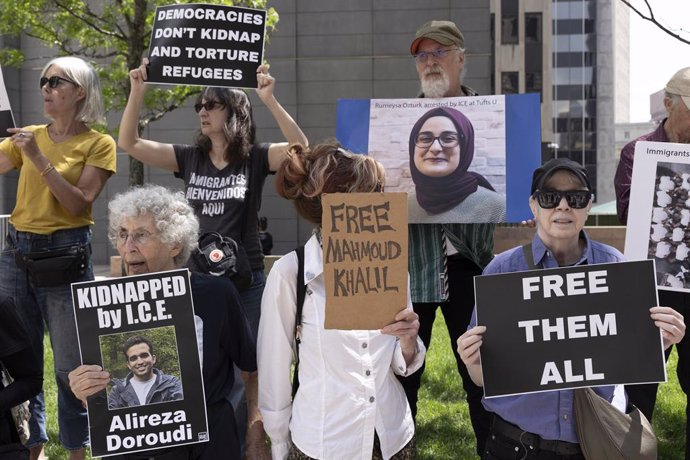 May 8, 2025, New York, New York, USA: Demonstrators with the activist group Rise and Resist hold signs that read 'KIDNAPPED BY I.C.E. Alireza Doroudi' 'FREE MAHMOUD KHALIL'  'FREE THEM ALL' 'DEMOCRACIES DON'T KIDNAP AND TORTURE REFUGEES' 'Rumeysa Ozturk a