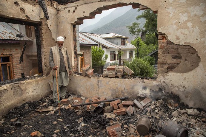 May 8, 2025, Uri Salamabad, Jammu And Kashmir, India: A Kashmiri elderly man looks towards the debris of his house damaged by cross-border shelling in Salamabad village, near the Line of Control Uri. India and Pakistan have entered their deadliest clash i