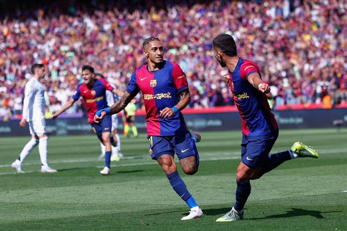 Raphinha Dias Belloli of FC Barcelona celebrates a goal during the Spanish League, LaLiga EA Sports, football match played between FC Barcelona and Real Madrid at Estadi Olimpic Lluis Companys on May 11, 2025, in Madrid, Spain.
