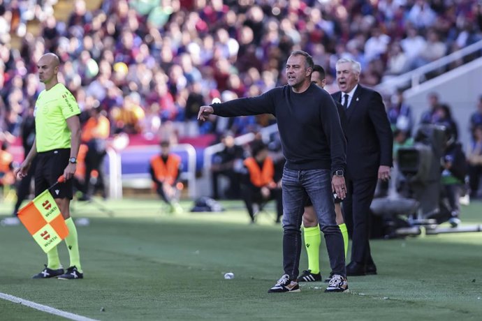 Hansi Flick, head coach of FC Barcelona gestures during the Spanish league, La Liga EA Sports, football match played between FC Barcelona and Real Madrid at Estadi Olimpic Lluis Companys on May 11, 2025 in Barcelona, Spain.