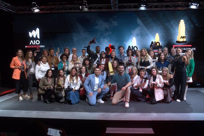 Algunos miembros de RIC en un evento presencial de AIO