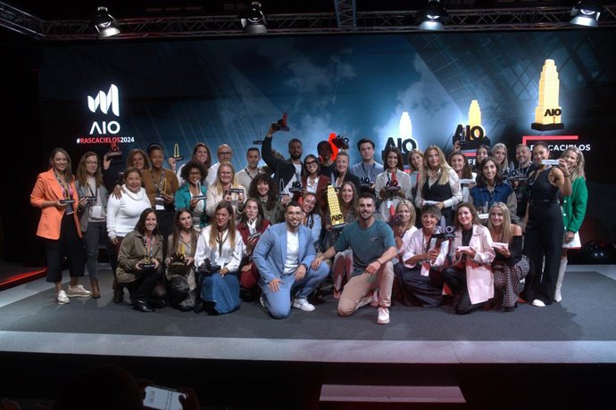 Algunos miembros de RIC en un evento presencial de AIO